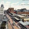 Look down Tremont Street in downtown Galveston, Texas with the Tremont hotel in the distance on the left from 1900.